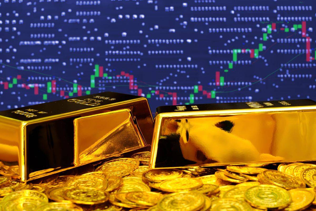 Kanak Capital Markets review on gold market trends featuring gold bars, coins, and price chart movement.